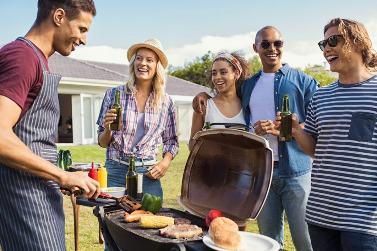 Friends enjoying party with bbq