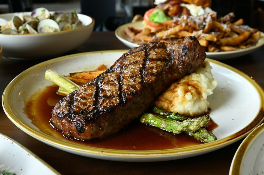 Restaurant dining, Food. NY Strip steak dinner