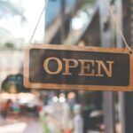 sign open on the door of the restaurant. open signboard