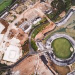 aerial photography of land and body of water