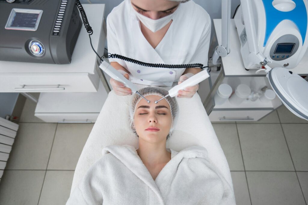 Cosmetological clinic. Model and doctor. Healthcare, clinic, cosmetology