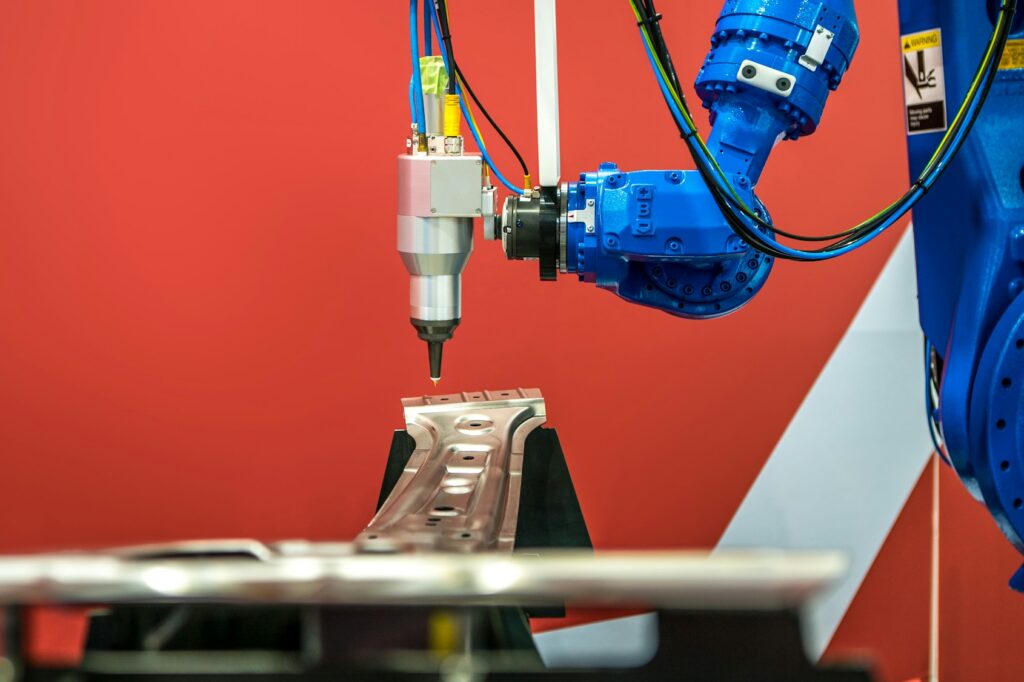 Industrial robotic welders weld the car body. Automobile production