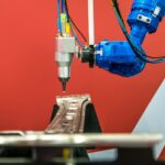Industrial robotic welders weld the car body. Automobile production