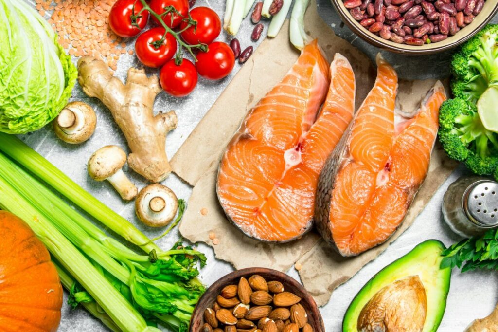 Organic food. Raw salmon fish with healthy food.