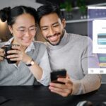 Credit card hologram, online shopping or couple with phone for bill payment, internet purchase or e
