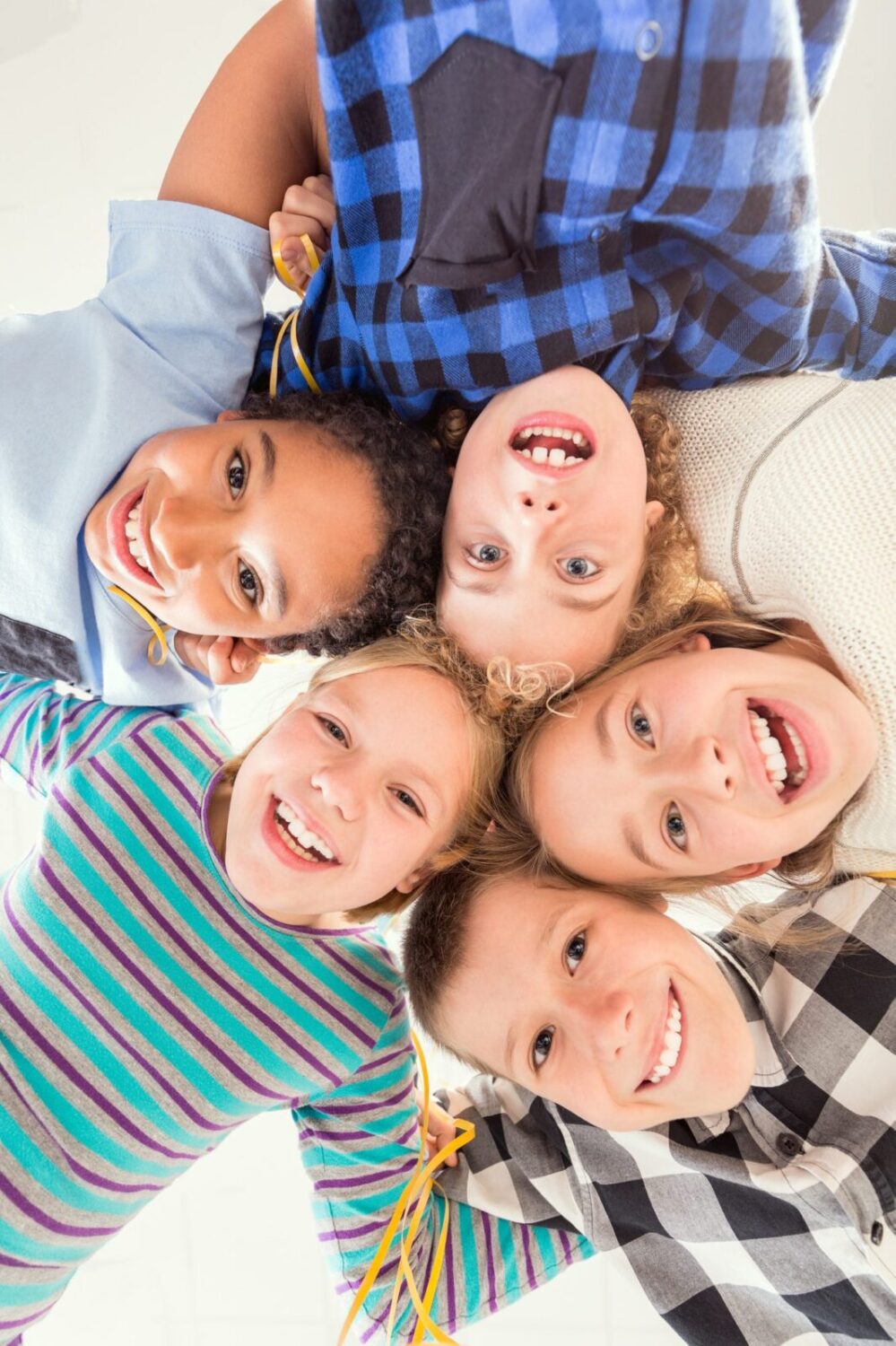 Children touching their heads