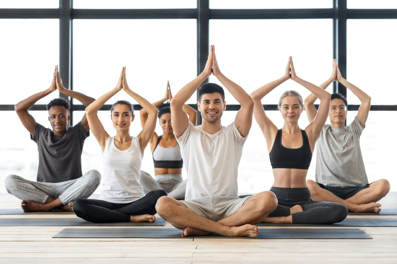 Why Group Fitness Classes Can Enhance Your Yoga Practice