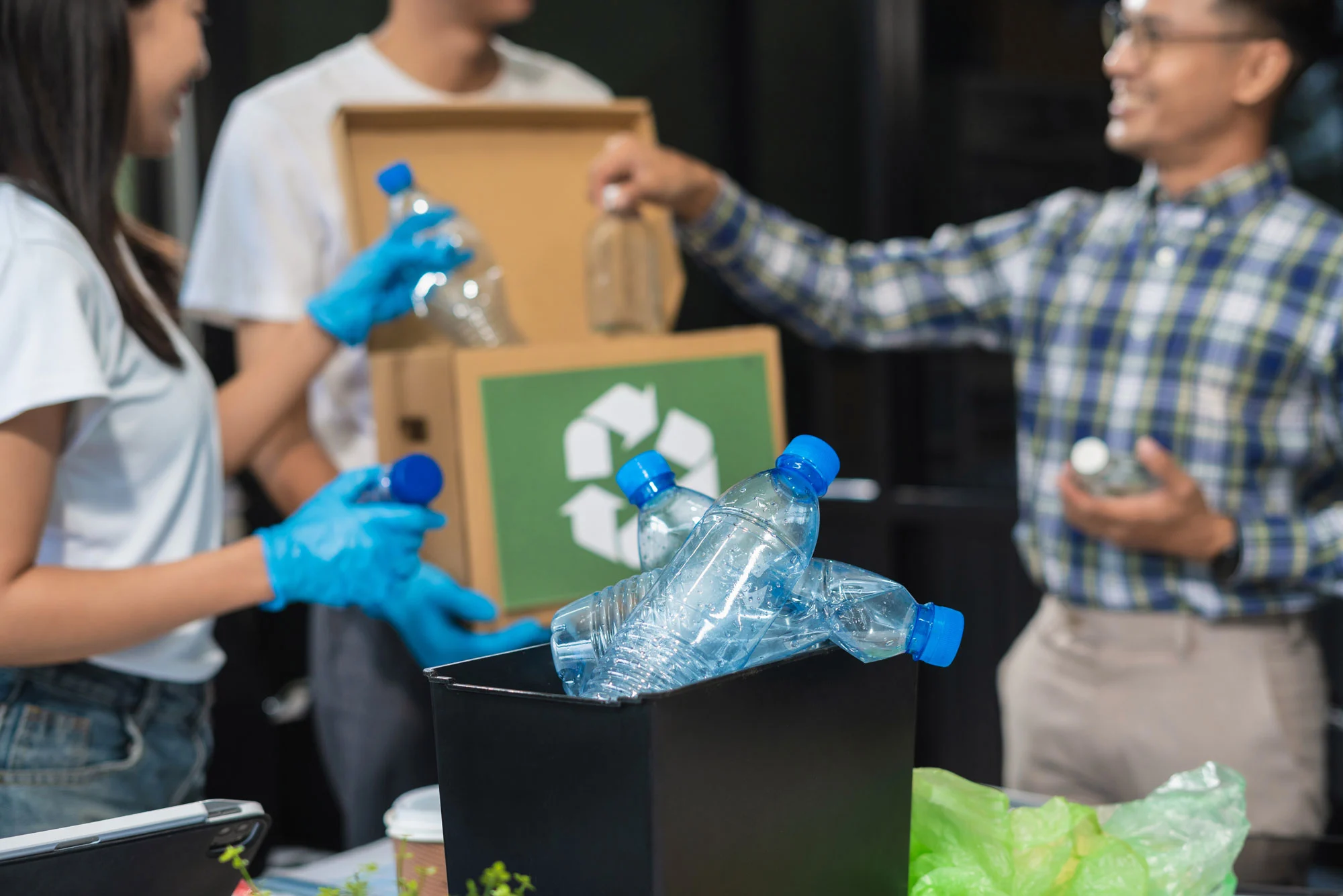 business-people-working-examining-waste-recyclable-2024-12-19-19-31-19-utc2.webp
